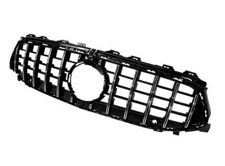 A black car grille with vertical slats and a circular emblem space, positioned against a plain white background.