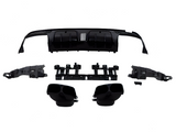Automobile rear bumper diffuser parts, disassembled and laid out; includes end pieces, exhaust tips, and center grille. The components are black and arranged against a plain white background.