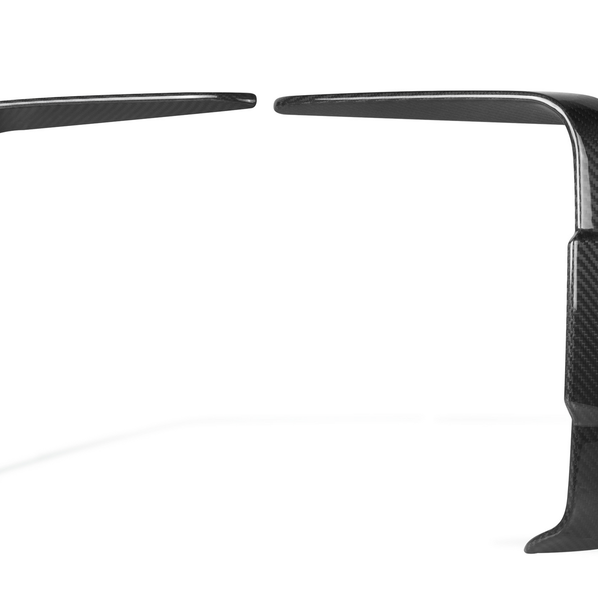 Two carbon fiber car dash trims are positioned vertically, facing each other, against a plain white background.