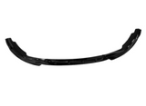 Black, curved car spoiler resting on a white background, designed for aerodynamic enhancement and visual appeal.