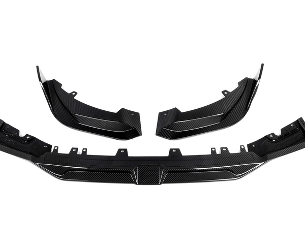 Three carbon fiber car parts are arranged symmetrically on a white background. The sleek components feature bolt holes, indicating their purpose for vehicle assembly or enhancement.