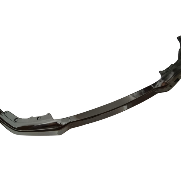 A dark, curved car bumper is shown from a front angle, displaying its aerodynamic design against a plain white background.