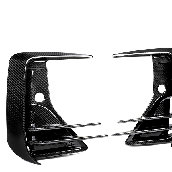 Two black carbon fiber car grille inserts with horizontal slats are positioned next to each other against a white background.