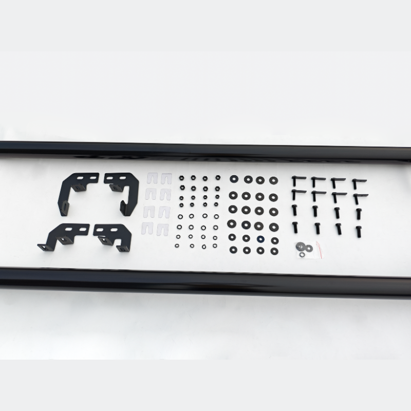 A collection of black metal brackets, screws, and washers is neatly arranged on a white surface, suggesting an assembly kit or hardware package.