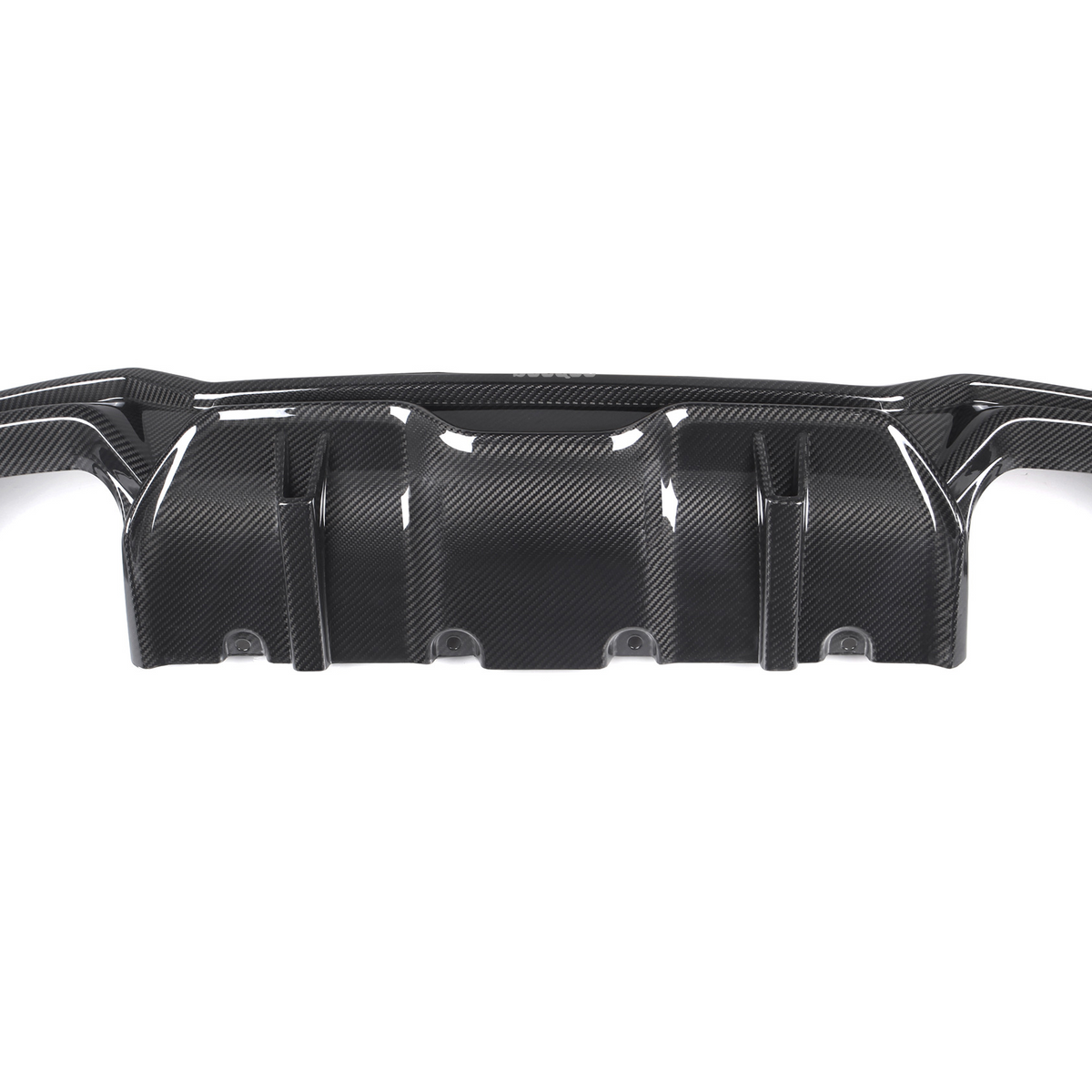 A black carbon fiber car diffuser with a textured surface, positioned centrally with two smaller side pieces detached, set against a plain white background.