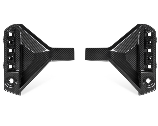 Two carbon fiber car parts, symmetrically placed facing each other, with multiple cut-out sections and glossy surfaces, set against a plain white background.