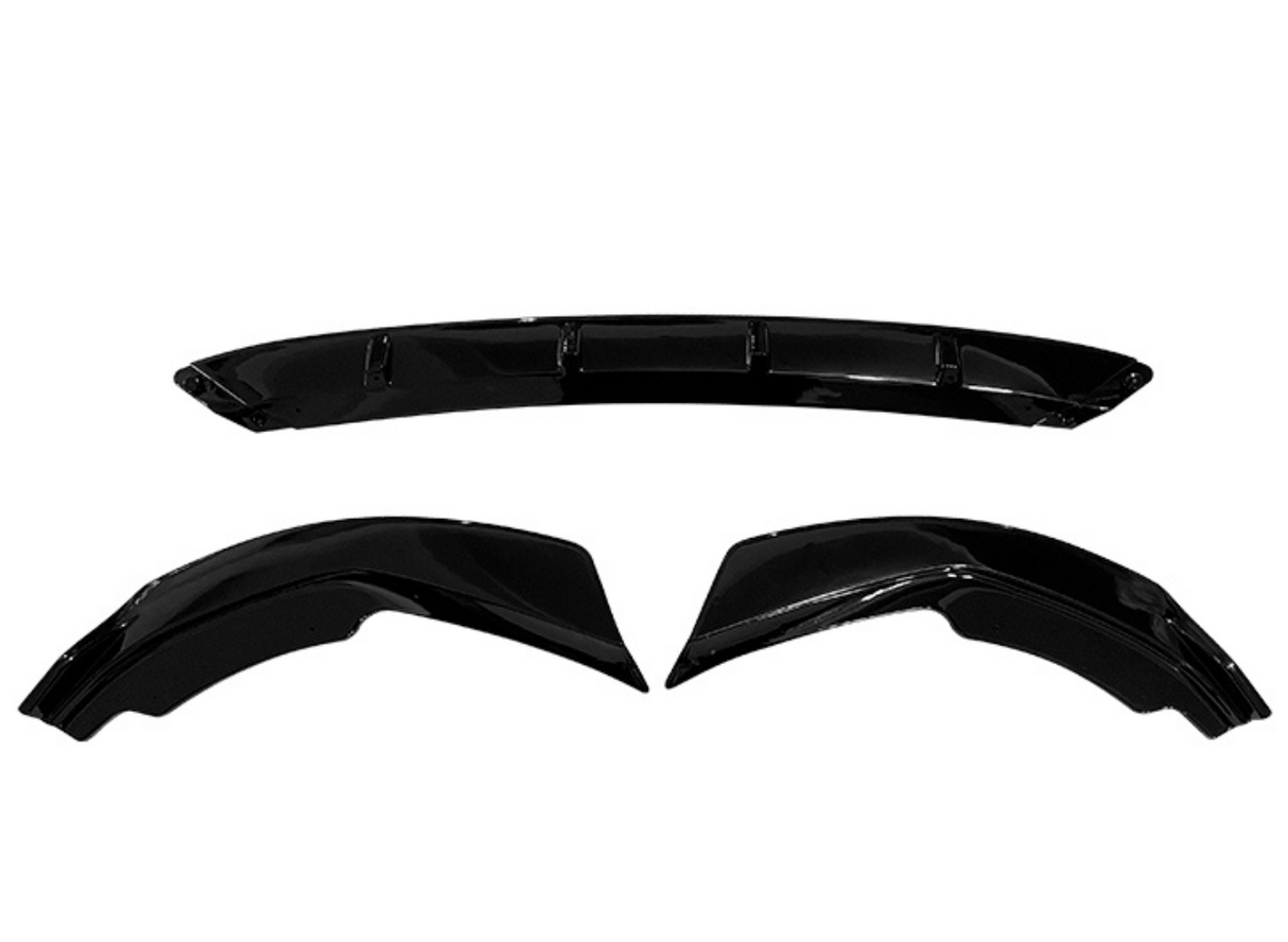 Three black car body parts lie on a white background: a long rear spoiler above, with two matching wheel arch flares below.
