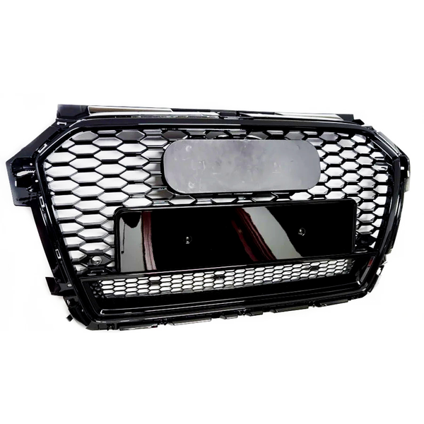 A black honeycomb car grille with a rectangular emblem and license plate holder, set against a plain white background.