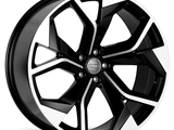 A shiny, black and silver, multi-spoke car wheel with an Audi logo at the center, displayed against a plain white background.