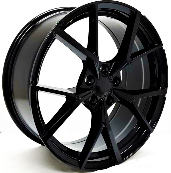 A sleek, black alloy wheel with a multi-spoke design stands against a plain white background, showcasing intricate angular patterns and a polished surface.