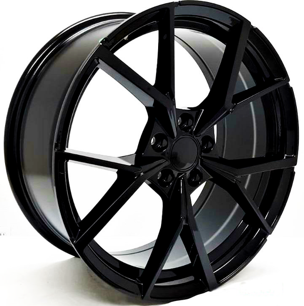 A glossy black wheel rim with a multi-spoke design, resting upright on a plain surface, its sleek finish reflecting light subtly. No text is present.