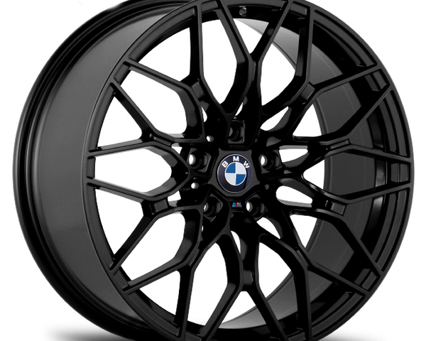 A black, intricately designed car wheel rim with BMW logo in the center, displayed on a plain white background.