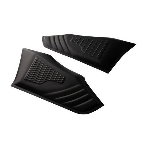 Two black, textured rubber pads feature a honeycomb pattern, lying side by side on a white surface, designed likely for gripping or protective use.