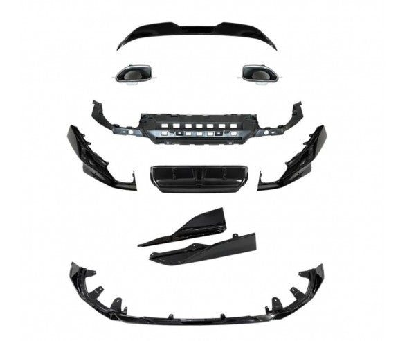 A collection of car body parts, including grills and bumper components, is arranged separately. The pieces are black and spread out against a plain white background, indicating disassembled condition.