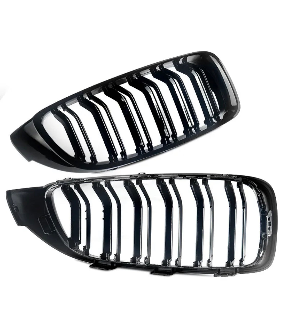 A pair of sleek, glossy black car grille inserts, each featuring vertical slats, is displayed against a plain white background.
