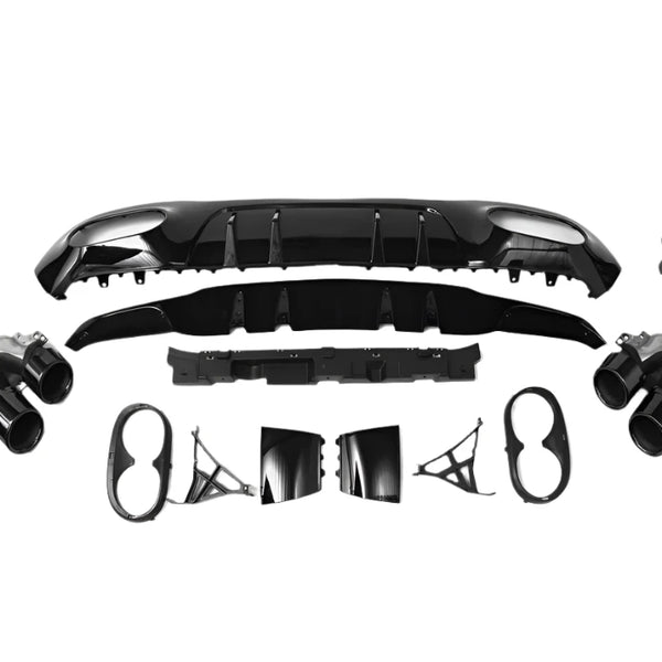 Car bumper assembly kit, showing multiple black and silver parts arranged symmetrically, including fender pieces and exhaust tips, isolated on a white background.