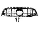 A black car grille with a large central circular opening and grid pattern, displayed against a white background. Below it are two mounting brackets and four screws.