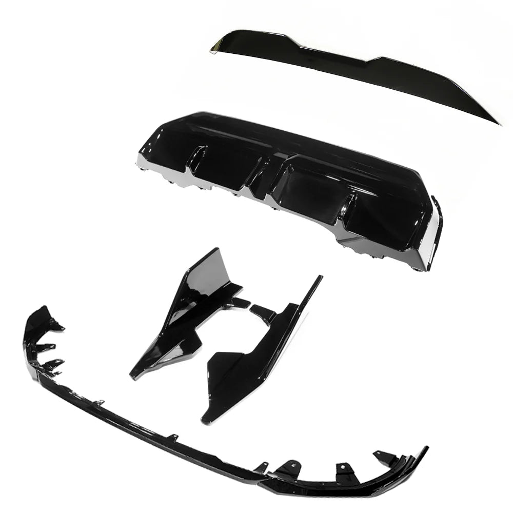 Several glossy black car body kit components are arranged separately, displaying various aerodynamic shapes designed for vehicle exterior modification, all set against a plain white background.
