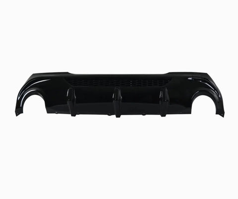 A glossy black car rear bumper diffuser lies horizontally. It features three vertical fins and a mesh section, isolated against a plain white background.