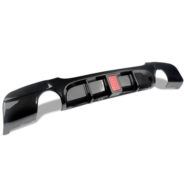 A carbon fiber car bumper diffuser with a rectangular red light is displayed on a white background, showcasing its glossy finish and aerodynamic design.