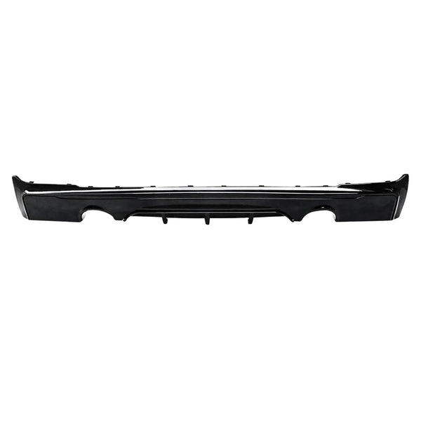 A sleek black car bumper with aerodynamic grooves shown against a white background, highlighting its streamlined design. The bumper has cutouts and contours, suggesting modern styling.