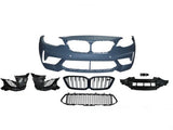 Car bumper kit displayed with grille, fog light holders, and mesh grille sections. Components are laid out symmetrically against a plain white background, showcasing automotive parts assembly.