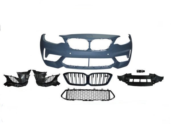 Car bumper kit displayed with grille, fog light holders, and mesh grille sections. Components are laid out symmetrically against a plain white background, showcasing automotive parts assembly.