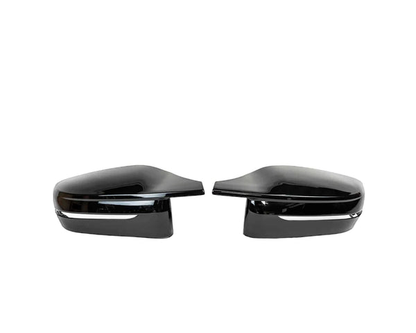Two glossy black car side mirrors are facing each other, placed against a plain white background, highlighting their sleek design and reflective surfaces.