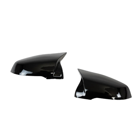 Two black side mirror covers are shown, facing each other, with a glossy finish, placed against a plain white background.