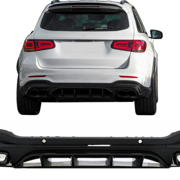 A white SUV is parked, viewed from the rear, with a focus on its black bumper positioned below in a separate detail view, highlighting its design and exhaust components.