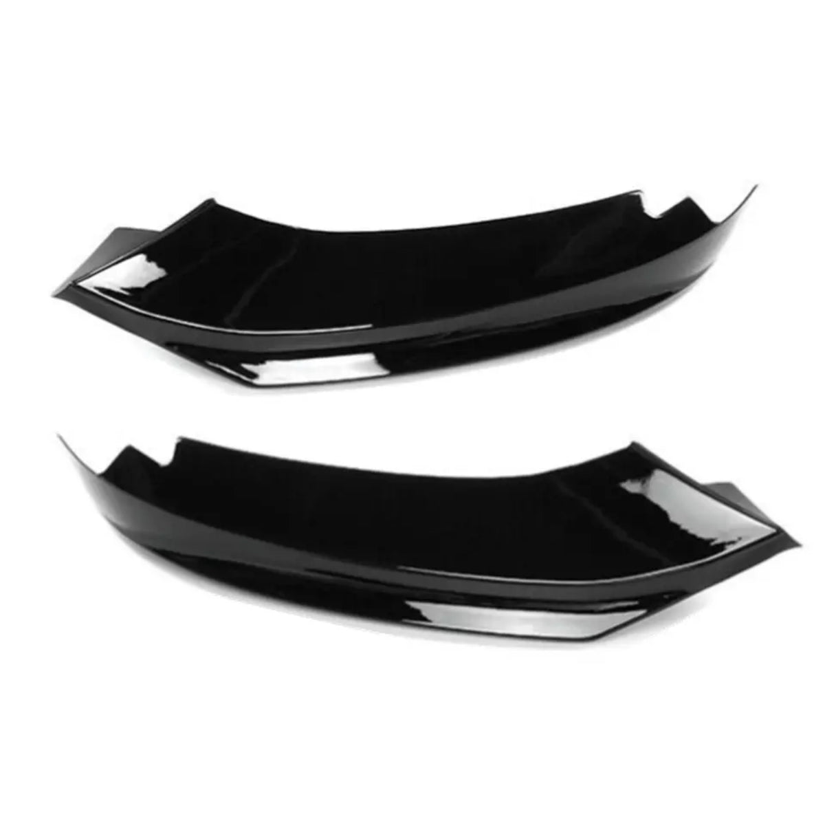 Two black, glossy aerodynamic car accessories lie side by side against a plain white background, showcasing their smooth, curved design and angular edges.