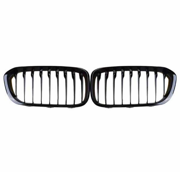 A pair of black, horizontally aligned kidney-shaped car grilles with vertical slats, set against a plain white background.