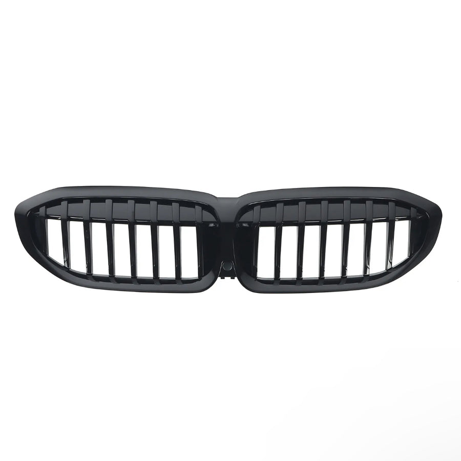 A glossy black car grille with vertical slats, shaped in two connected oval sections, is isolated on a white background.