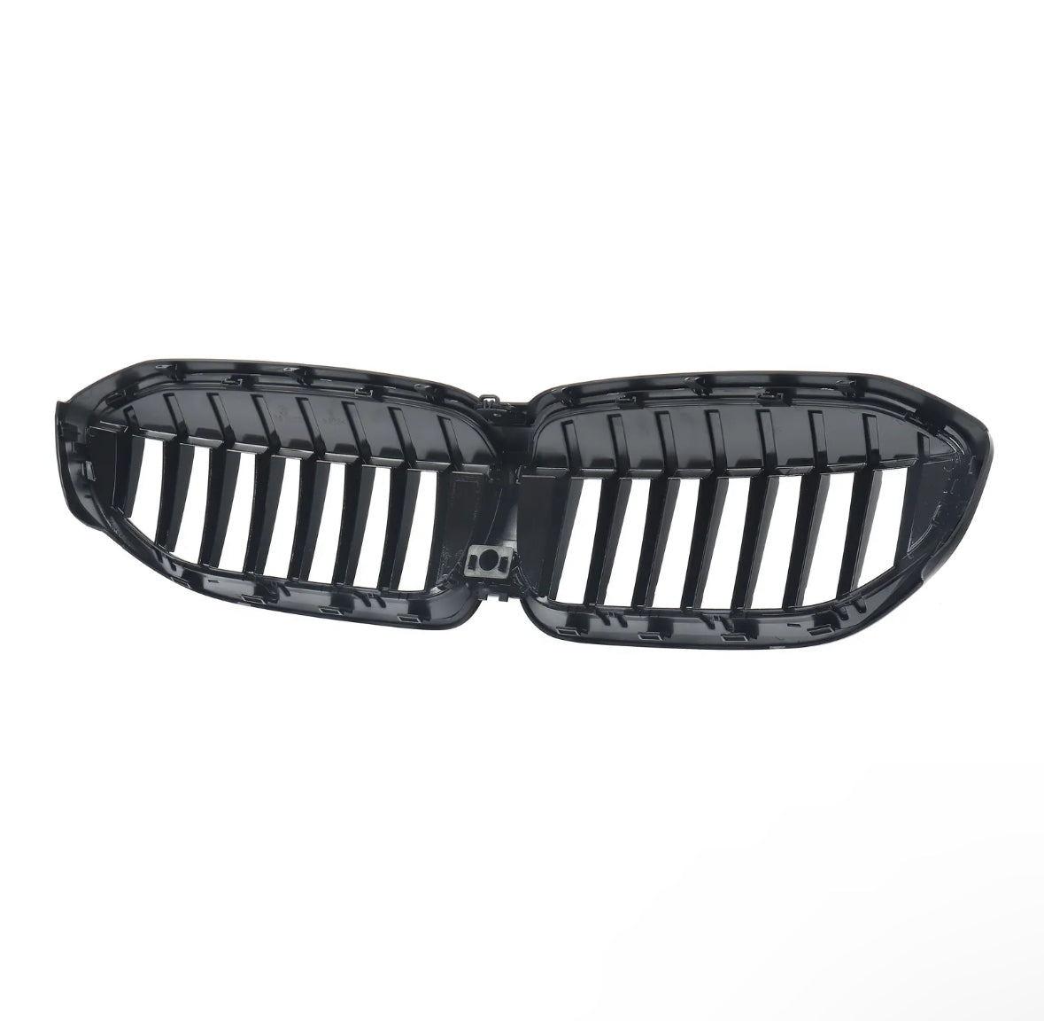 A glossy black automotive grille with vertical slats is centered against a plain white background, resembling a kidney shape, commonly used in car fronts for air intake.