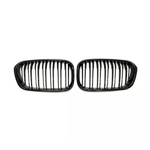 Two black car grilles with vertical slats are positioned side by side on a white background, suggesting they are replacement parts for specific vehicle models.