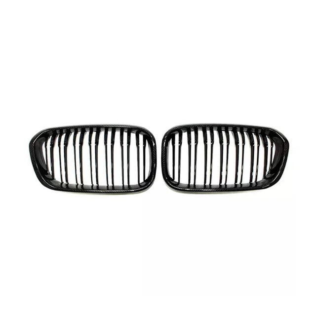 Two black car grilles with vertical slats are positioned side by side on a white background, suggesting they are replacement parts for specific vehicle models.