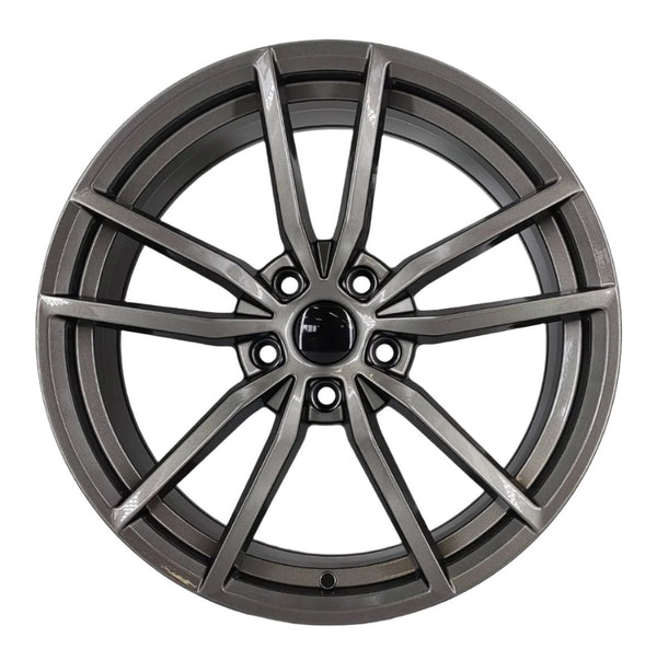 A sleek, polished alloy wheel with a multi-spoke design, featuring a central hub surrounded by five bolt holes. The wheel is isolated against a plain, white background.