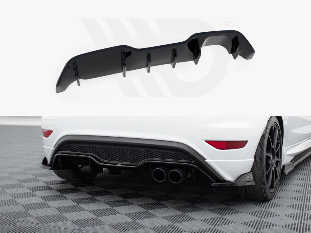 Black car diffuser resting on a white background; the lower section shows it installed on a white car's rear, with dual exhausts and a black rear bumper, on a checkered surface.
