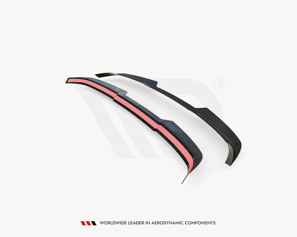 Two black aerodynamic components featuring red accents rest on a plain white background. Text below reads, "WORLDWIDE LEADER IN AERODYNAMIC COMPONENTS."