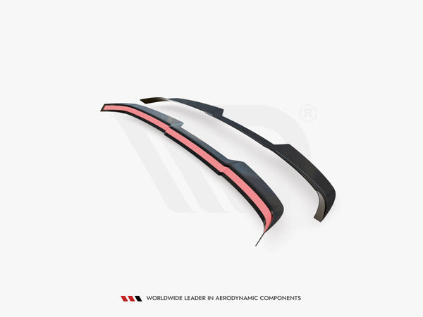 Two black aerodynamic components featuring red accents rest on a plain white background. Text below reads, "WORLDWIDE LEADER IN AERODYNAMIC COMPONENTS."