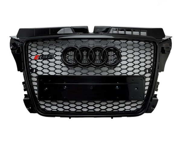 Car grille with a black honeycomb pattern featuring four interlocking rings logo and "RS 5" badge on the side, designed for a vehicle's front-end.