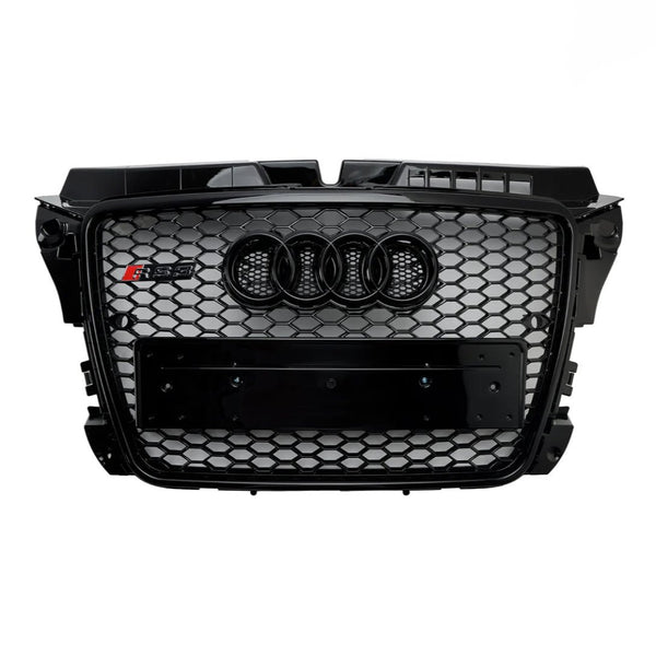 Car grille with a black honeycomb pattern featuring four interlocking rings logo and "RS 5" badge on the side, designed for a vehicle's front-end.