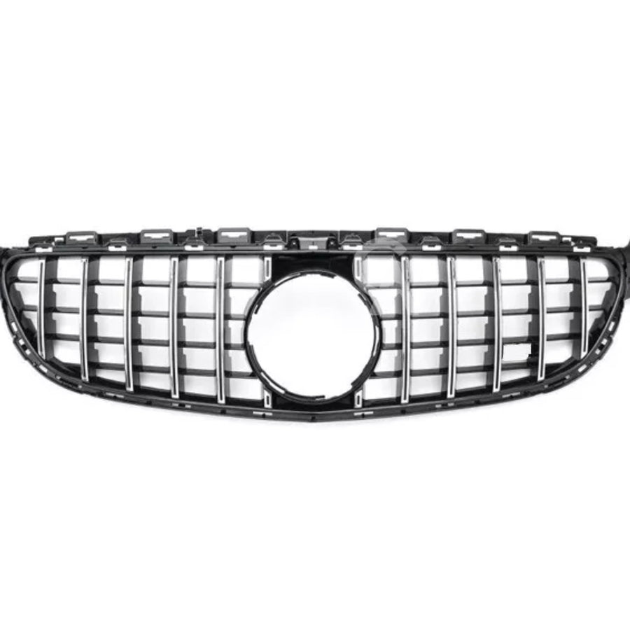 Car grille with vertical chrome slats and a central circular emblem space; displayed against a plain white background.