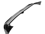 Glossy black car spoiler angled upward, designed for aerodynamic enhancement, isolated against a plain white background.