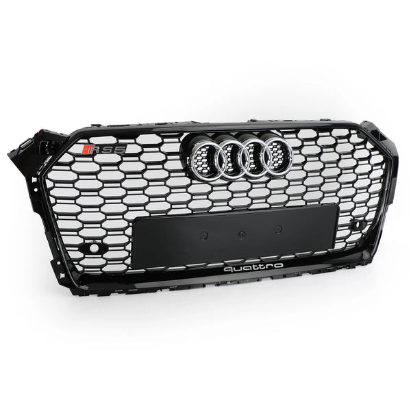 A black Audi car grille with a honeycomb pattern features a chrome Audi emblem, "RS5" badge, and the word "quattro" at the bottom, displayed against a plain white background.