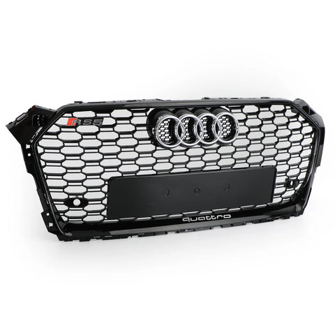 A black Audi car grille with a honeycomb pattern features a chrome Audi emblem, "RS5" badge, and the word "quattro" at the bottom, displayed against a plain white background.