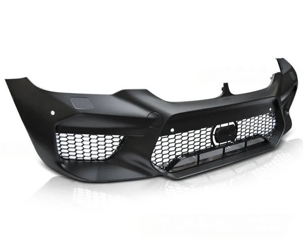 A black car front bumper with a honeycomb grille sits on a white reflective surface, displaying a sleek and aerodynamic design with empty light spaces.