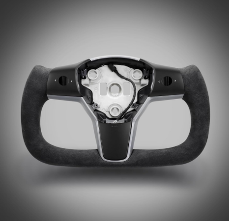 A futuristic, U-shaped car steering wheel with a sleek black finish and exposed mechanical components sits against a gradient gray background.