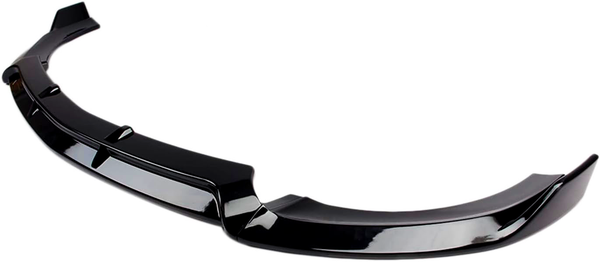 A black car bumper lip sits on a white background. It features a sleek, curved design with an aerodynamic structure, designed to fit under a vehicle’s front bumper.