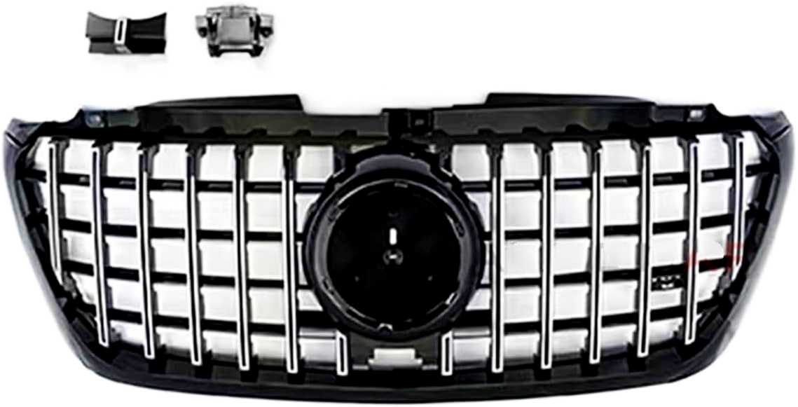 Car grille features vertical chrome bars and central circular mount, with two small components above it, all set against a plain white background.